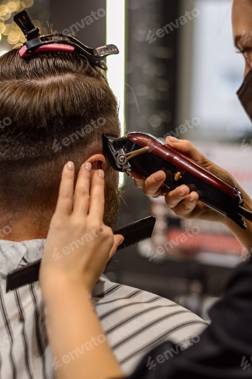Preview: A man gets a haircut in a salon