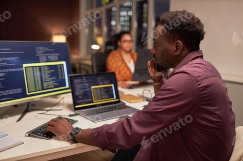 Preview: Developer writing computer codes on computer