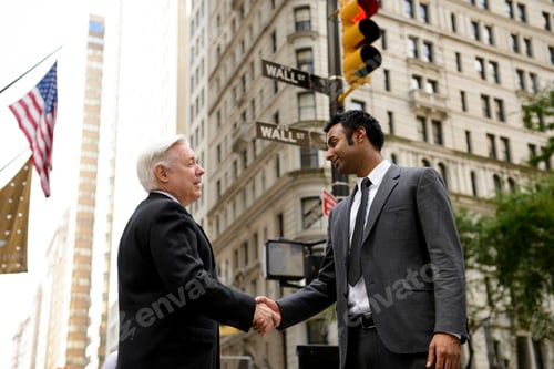 Preview: Businessmen shaking hands on Wall Street, New York City
