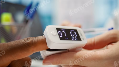 Preview: Medical specialist takes oxygen saturation measurement and checking vital signs