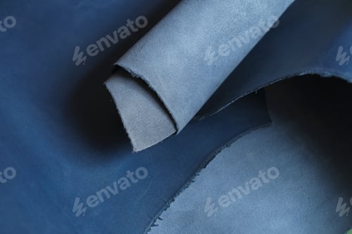 Preview: collection of high-quality blue leather swatches in various shades, showcasing their natural