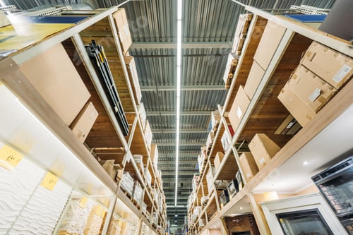Preview: bottom view of shelves with boxes in warehouse