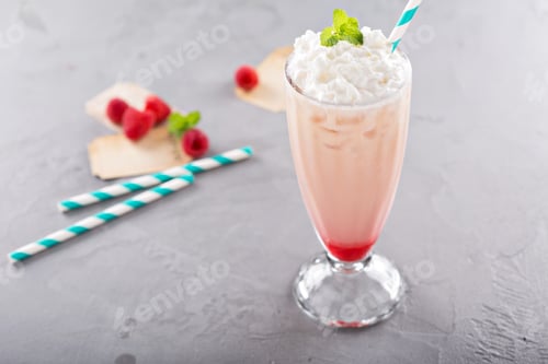 Preview: Iced milkshake with raspberry syrup and whipped cream