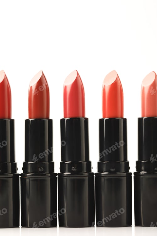 Preview: row of lipsticks of different shades isolated on white