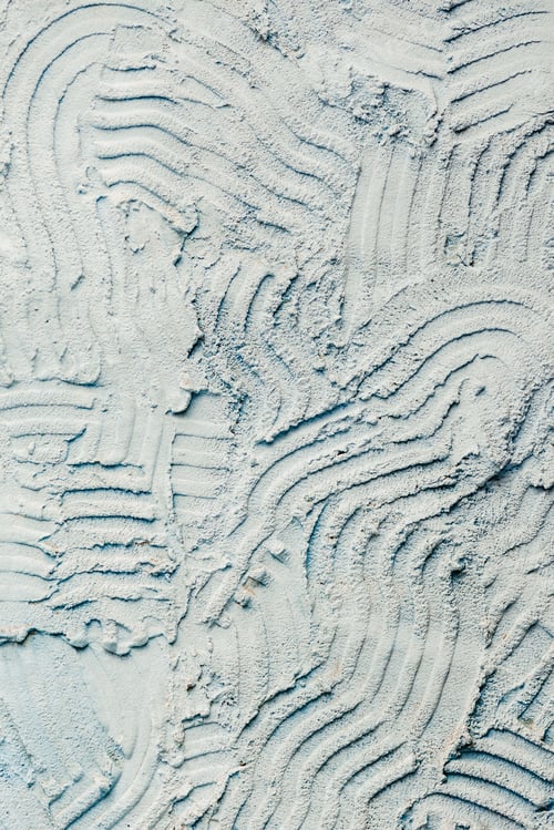 Preview: Closeup of pastel blue wall with abstract concrete textures, perfect for wallpapers