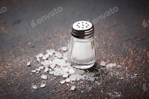 Preview: White sea salt on rusty background