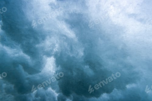 Preview: Underwater View of Wave Crashing to Shore Spraying Drops of Water Across the Sea