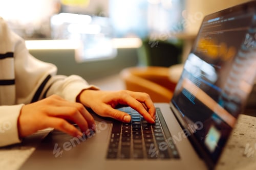 Preview: A young woman is engaged in typing on a laptop. Cyber security. Business, Freelance, Shopping
