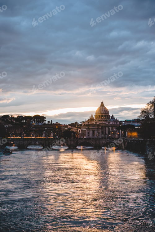 Preview: st peters basilica and tiber river during sunrise in Rome, Italy