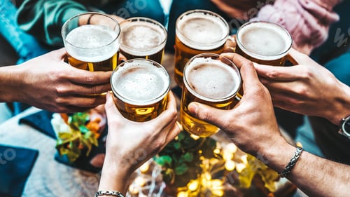 Preview: Group of people drinking beer at brewery pub restaurant