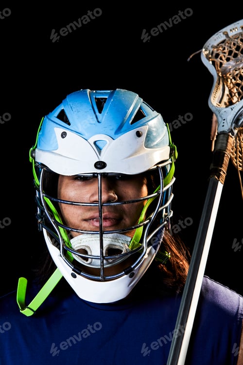 Preview: Portrait of lacrosse player, black background