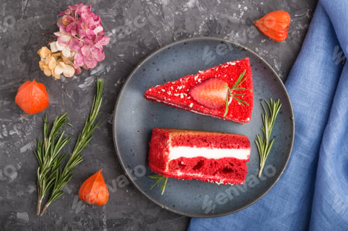 Preview: Homemade red velvet cake with milk cream and strawberry with cup of coffee on a black concrete