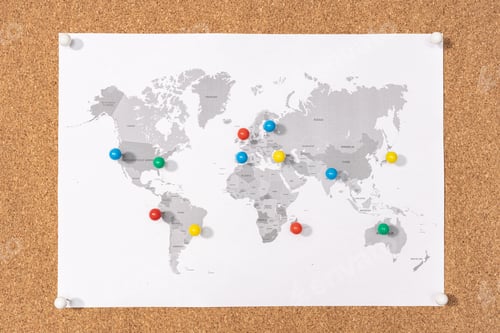 Preview: Pushpins on world map on Corkboard