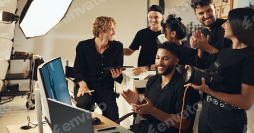 Preview: Happy, people or clapping for photography success for production results, project or review. Teamwo