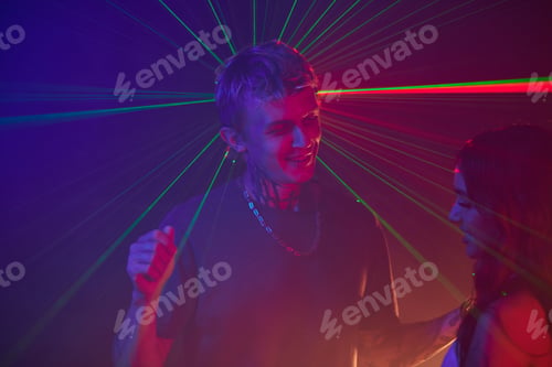 Preview: Couple Dancing and Flirting in Club