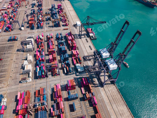 Preview: Aerial view of busy container terminal and cargo cranes