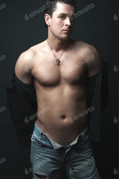 Preview: Strong Athletic Man On Black Background