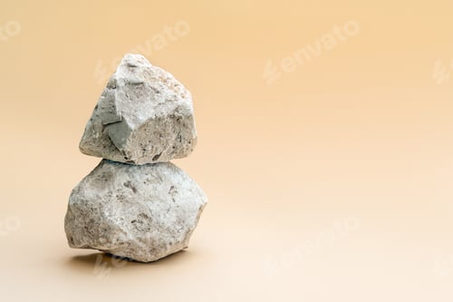 Preview: Minimal modern product display on beige background with grey stones.
