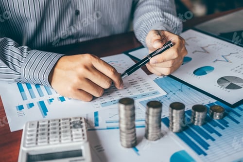 Preview: Analyzing Financial Data and Coin Stacks on Desk