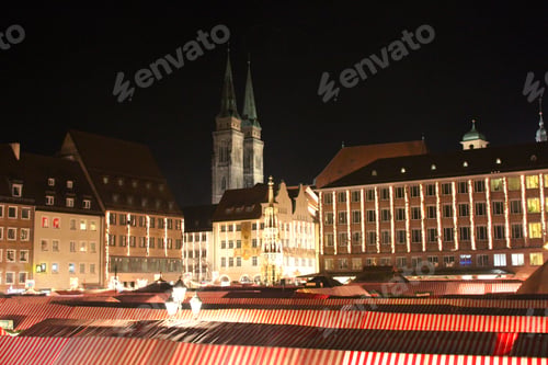 Preview: View of Christmas market tents and architecture of Nuremberg at night