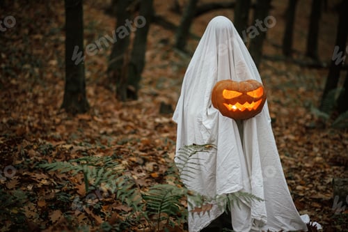 Preview: Spooky ghost holding glowing jack o lantern in moody dark autumn forest