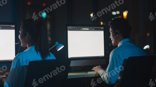Preview: Asia young call center team or customer support service executive using computer.