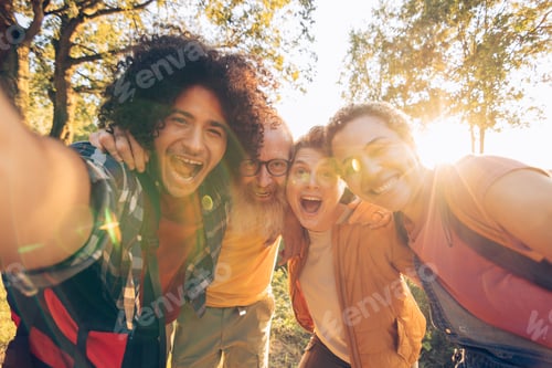 Preview: happy women and men friends outdoors having fun on vacation