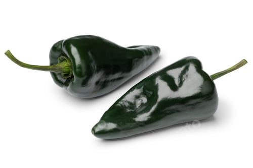 Preview: Pair of fresh green Mexican Poblano Pepper close up on white background