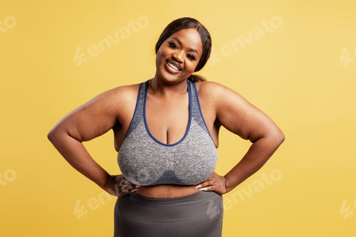 Preview: Black plus size woman smiling representing body positivity