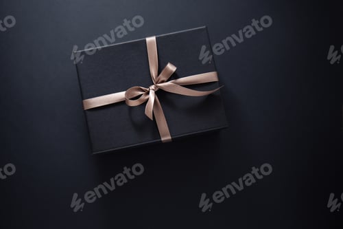 Preview: Gift wrapped in dark paper on dark background
