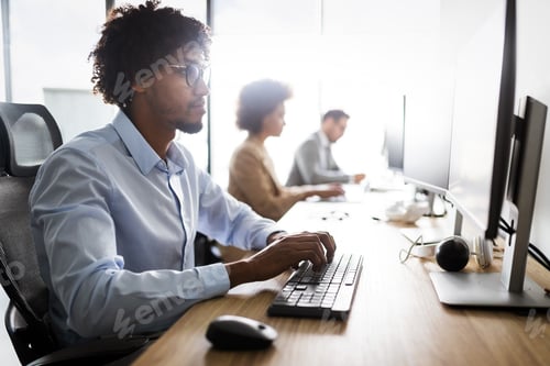 Preview: Successful business group of people at work in office