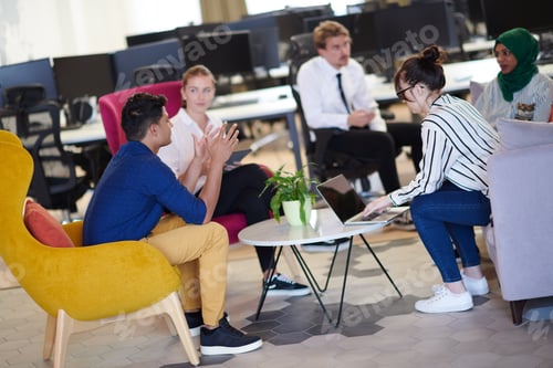 Preview: Multiethnic startup business team having team building