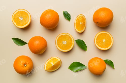 Preview: Fruit pattern of fresh orange slices on colored background. Top view. Copy Space.