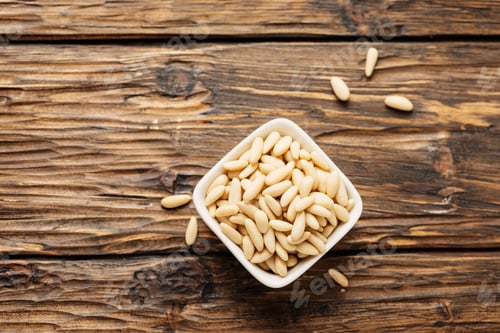 Preview: pine nut on the wooden table