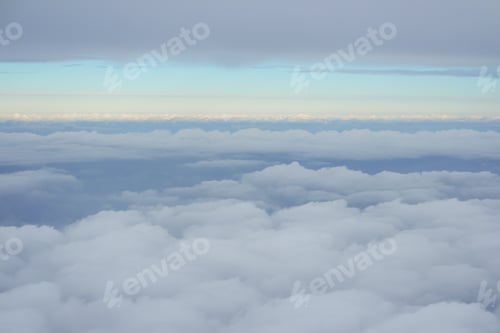 Preview: View from the airplane windows. Horizon above the clouds.