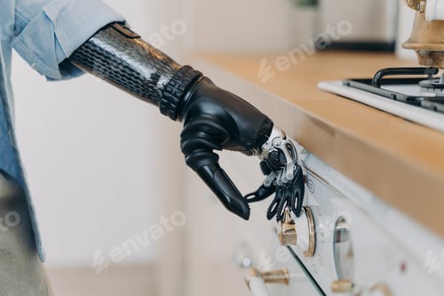 Preview: Bionic prosthetic arm adjust temperature on gas hob control panel, person with disability uses stove