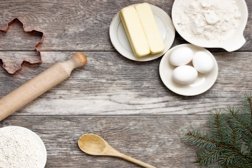Preview: Christmas baking flat lay with ingredients and decor with copy space