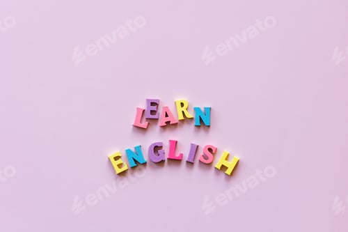 Preview: text learn english letters on pink background. Copy space. Language school