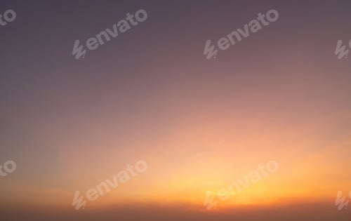 Preview: Sunset sky. Abstract nature background. Dramatic blue and orange, colorful clouds at twilight time.