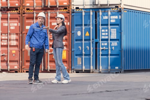 Preview: Container manufacturing manager and businesswomen survey the area to plan the storage