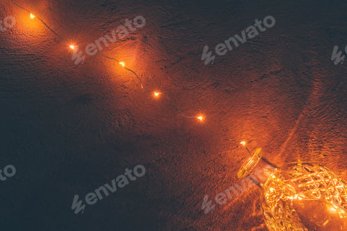 Preview: Lights garland in a glass bottle on a dark background