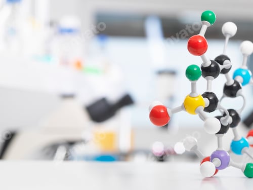 Preview: Molecular model structure sitting on a lab bench during a experiment.