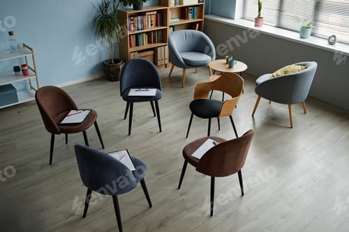 Preview: Circle of Chairs Arranged for Upcoming Teenager Counseling Group Meeting