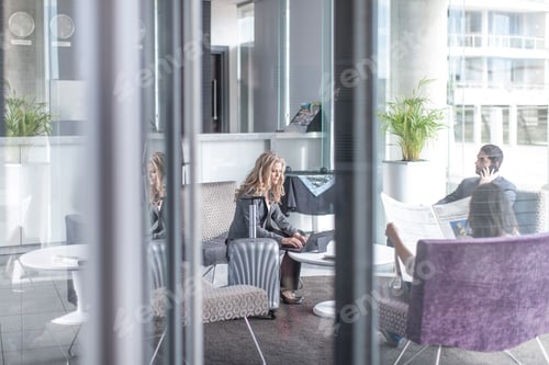 Preview: Business people in a hotel lobby