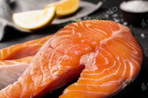 Preview: Fresh salmon steaks on table, closeup view