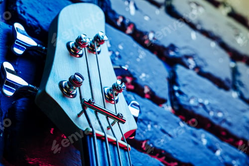 Preview: Guitar headstock with tuners on dark background