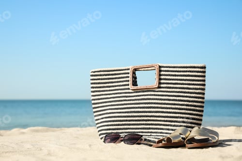 Preview: Stylish beach accessories on sandy sea shore