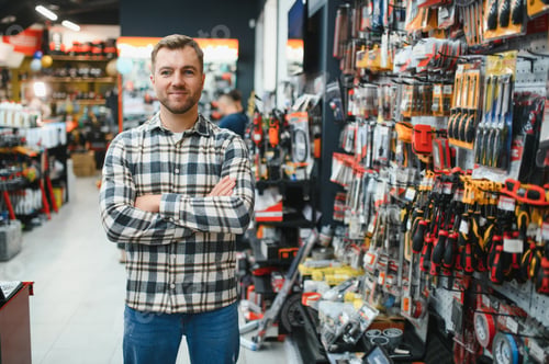 Preview: Young man working in hardware store