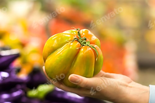 Preview: Women Hand Choosing Tomato At Supermarket
