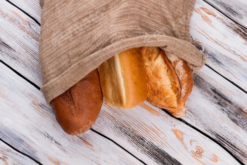 Preview: Artisan bread in burlap bag.